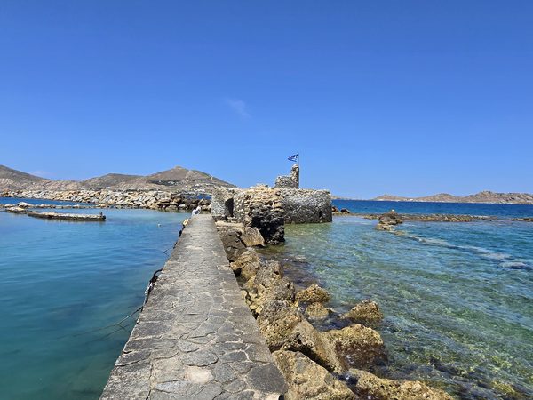 The ruined Venetian castle on the causeway at Naoussa fishing harbour on Paros